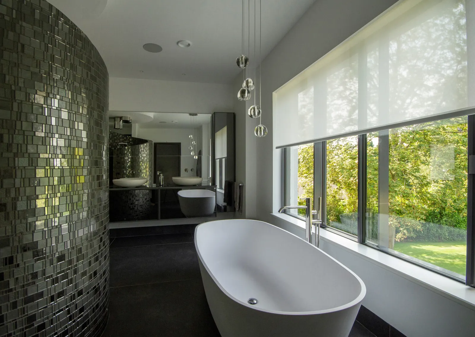 Bath with a concealed roller shade and a clean ceiling line - Shade down