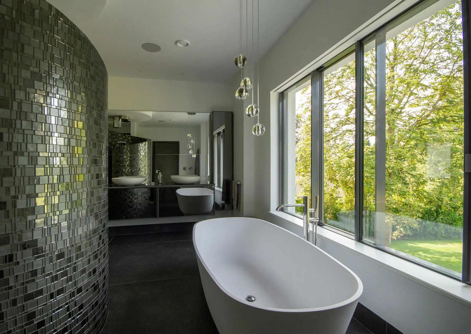 Bath with a concealed roller shade and a clean ceiling line - Shade up